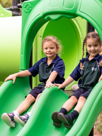 Children playing on slide