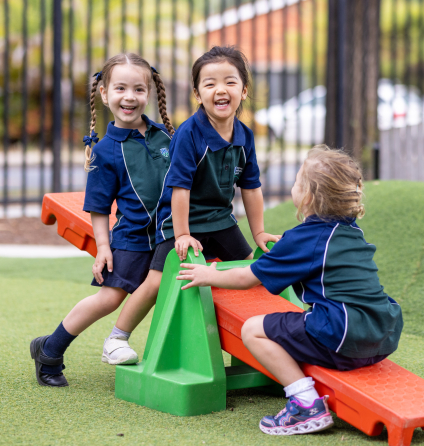 Children playing on seesaw